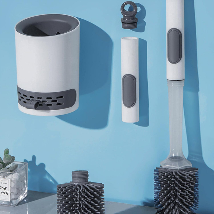 Cepillo de baño de silicona con dispensador integrado